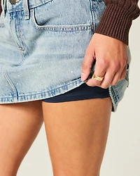 Low-Rise Medium Wash Studded Denim Mini Skort