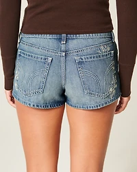 Ultra Low-Rise Medium Wash Floral Embroidered Denim Mini Shorts
