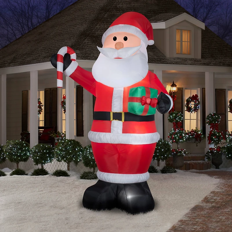 12ft. Airblown® Inflatable Santa with Gift & Candy Cane