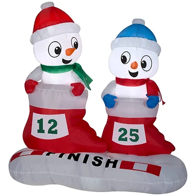 4ft. Airblown® Inflatable Christmas Snowman in Stocking Races