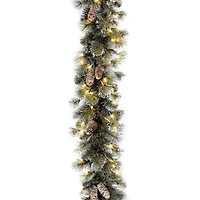 9' x 10" Pre-lit Glitter Artificial Christmas Pine Garland with Cones, Snowflakes and 100 Clear Lights