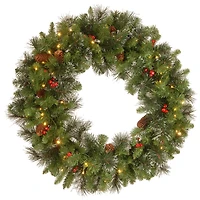 30" Crestwood® Spruce Wreath with Cones, Red Berries, Glitter & 70ct. Warm White Battery Operated LED Lights with Timer