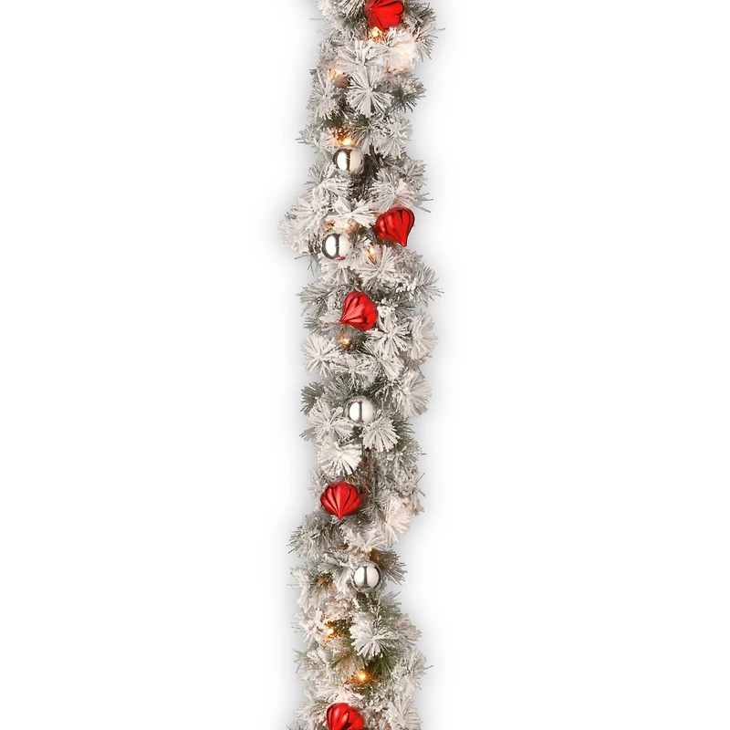 9 ft. Pre-lit Snowy Bristle Artificial Christmas Pine Garland with Red & Silver Ornaments & 70 Clear Lights