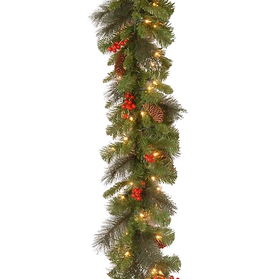 9ft. Pre-Lit Crestwood® Spruce Garland with Silver Bristle, Cones, Red Berries and Glitter with 50 Clear Lights