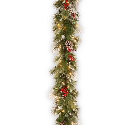 9ft. Pre-lit Feel Real® Wintry Berry Collection Artificial Christmas Garlands with Big Pine Cones, Red Berries & Snowy Bristle with 70 Clear Lights