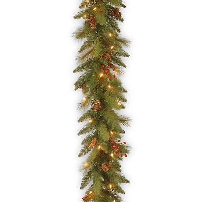 6' x 12" Pre-lit Decorative Collection Artificial Christmas Garland with 20 Cones, 5 Red Berries and 35 Clear Lights