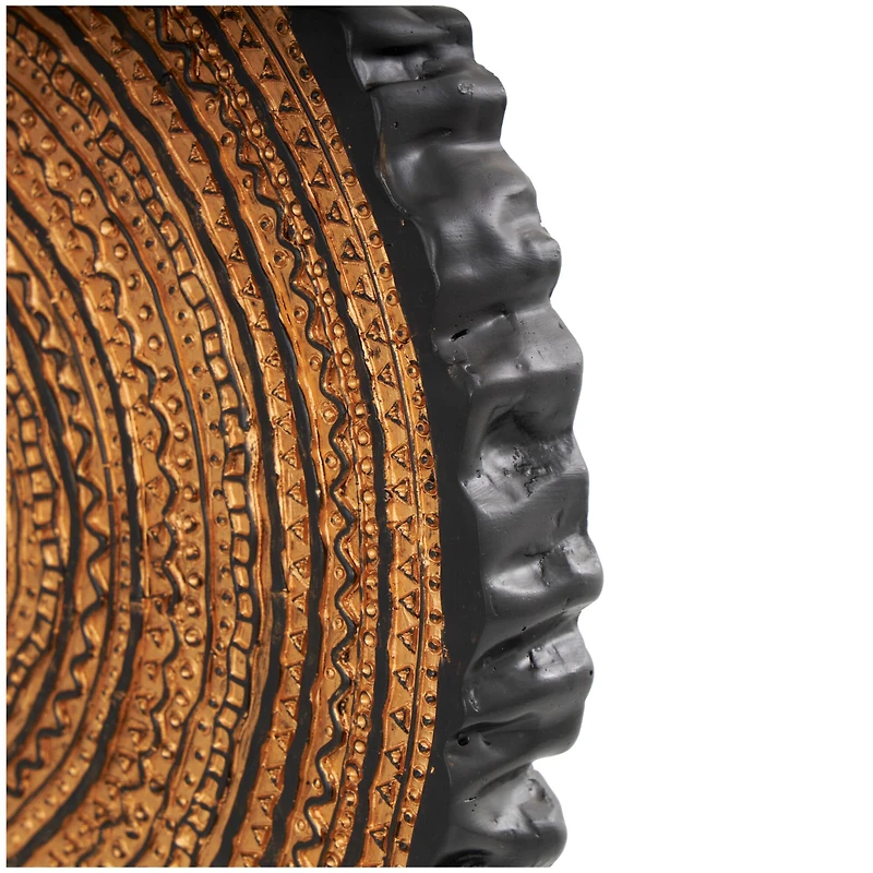 17" Brown Metal Tribal Carved Circular Sculpture with Black Stand & Wavy Edge