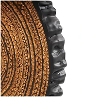 17" Brown Metal Tribal Carved Circular Sculpture with Black Stand & Wavy Edge