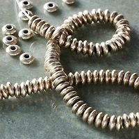 9 Pack:  Silver Smooth Metal Rondel Beads, 4mm by Bead Landing™