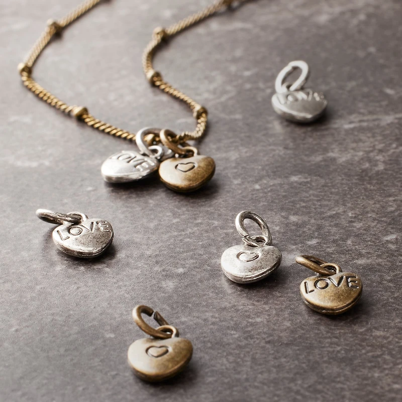 12 Packs: 25 ct. (300 total) Metal Heart-Shaped Charms by Bead Landing™