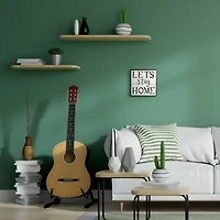 Stupell Industries Let's Stay Home Wall Art in Black Frame