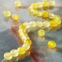 Yellow Faceted Agate Coin Beads by Bead Landing