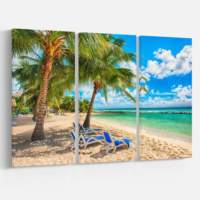 Designart - Blue chairs at the tropical white sand beach