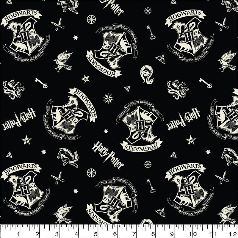 Harry Potter™ Black Tossed Icons Cotton Fabric