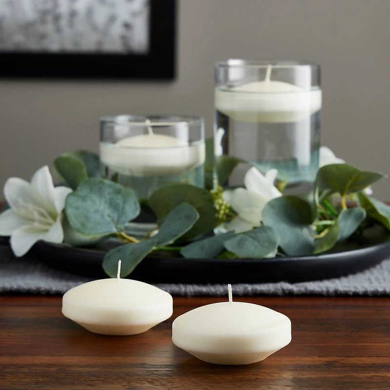12 Packs: 4 ct. (48 total) Basic Elements™ Ivory Floating Candles by Ashland®
