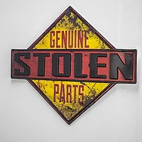 American Art Décor™ 18.25" Genuine Stolen Parts Embossed Metal Sign