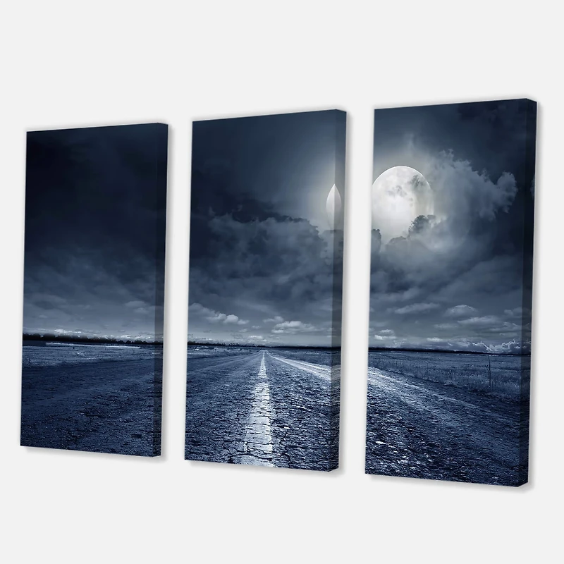 Designart - Asphalt Road Under Cloudy Full Moon I