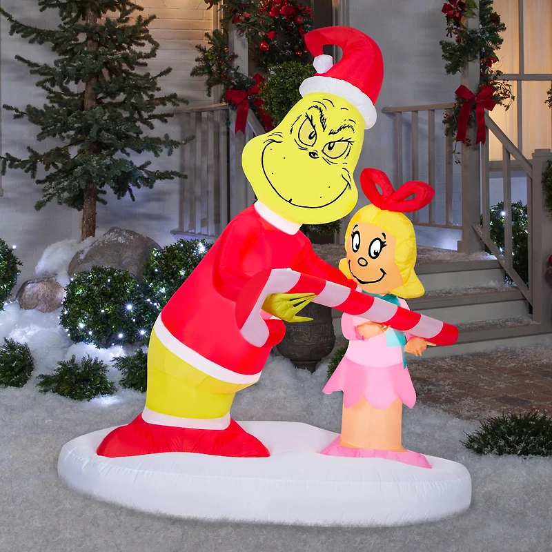 5.5ft. Airblown® Inflatable Christmas Grinch Passing Out Candy Canes to Cindy Lou