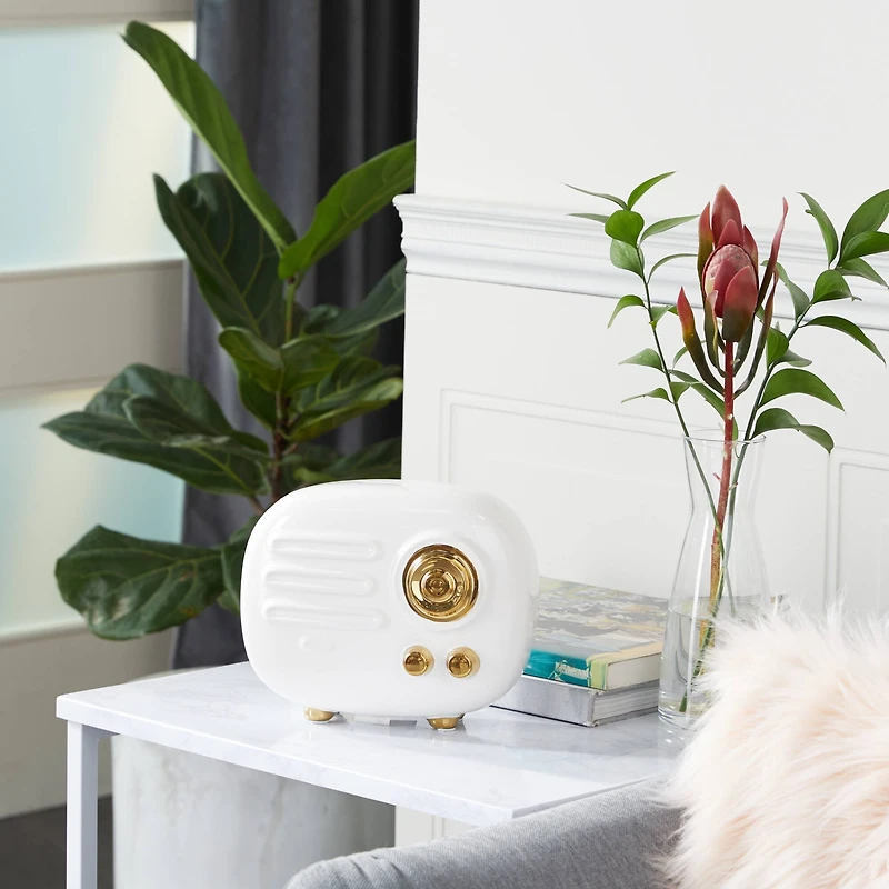 CosmoLiving by Cosmopolitan Gold Ceramic Modern Sculpture, Abstract 7" x 8" x 4"