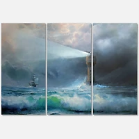 Designart - Lighthouse Shining Light During Stormy Night II