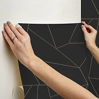 RoomMates Brilliant Black and Gold Peel and Stick Wallpaper. 20.5" x 18-ft roll and covers about 30.75 sq.