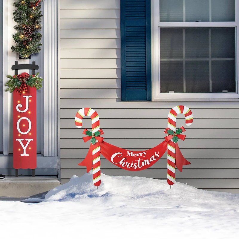 Glitzhome® 3ft. Merry Christmas Candy Cane Metal Yard Stake