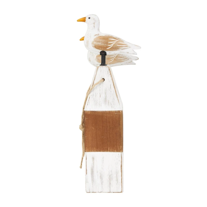 Brown Bird Sculpture with White Distressed Buoy Posts Set