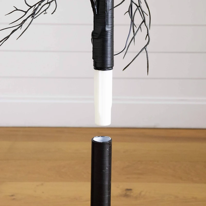 4ft. Pre-Lit Artificial Halloween Black Twig Tree with 24 Orange LED Pumpkin Shaped Lights