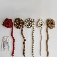 Hello Honey® 12ft. Handmade Wool Felt Ball Garland in Printed Drawstring Bag