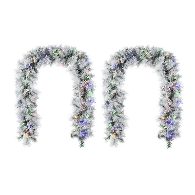 Glitzhome® 6ft Pre-Lit Snow Flocked Greenery Pine Christmas Garland with Timer, 2ct.