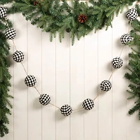 Glitzhome® 6ft. Black & White Plaid Fabric Garland Set