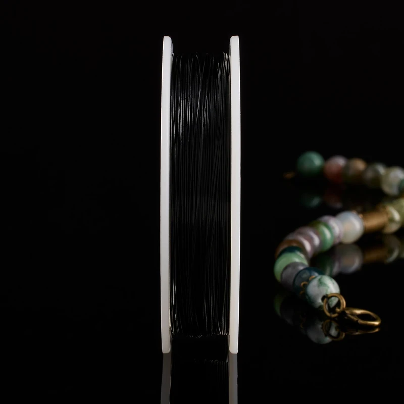 12 Pack: Beadalon® 0.015" Black 7 Strand Bead Stringing Wire, 60ft.