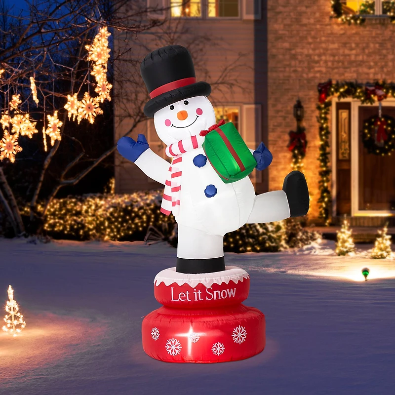 Glitzhome® 6ft. Lighted Inflatable Rotating Snowman Décor