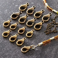 12 Packs: 76 ct. (912 total) Lobster Clasps and Crimps by Bead Landing™ 