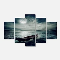 Designart - Boat Drifting Away After Storm - Large Seashore Canvas Art Print