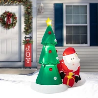 Glitzhome® 6.5ft. Lighted Dog Bites Santa Inflatable Décor