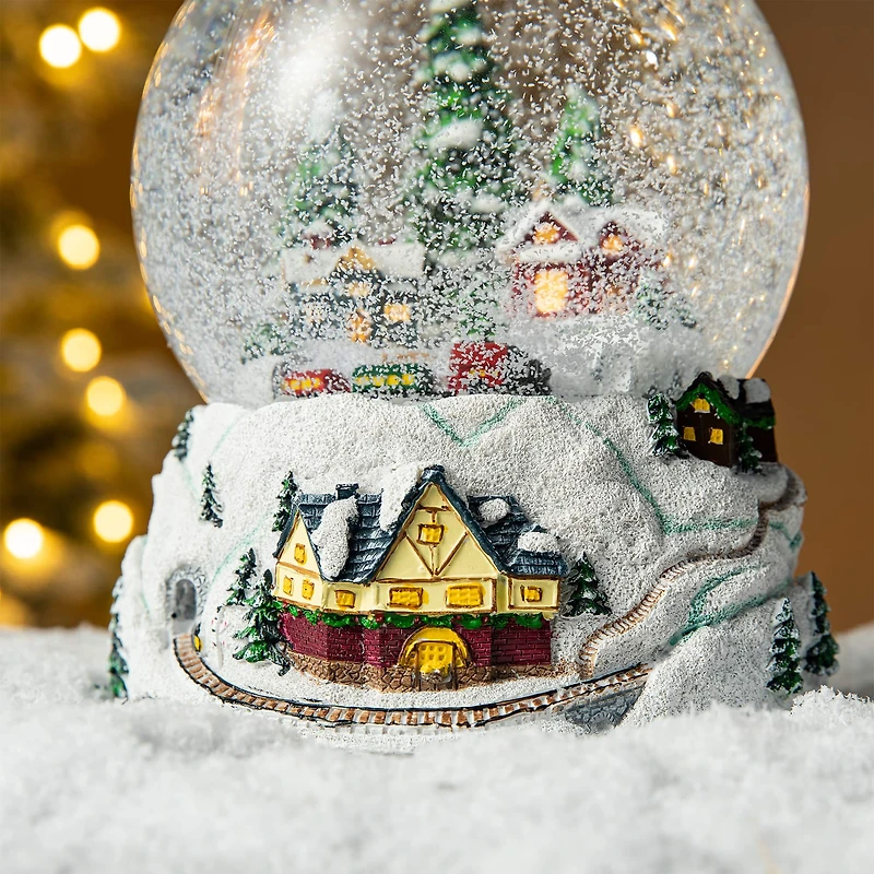 Glitzhome® 8" Lighted Musical Snowflakes Village Waterglobe
