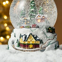 Glitzhome® 8" Lighted Musical Snowflakes Village Waterglobe