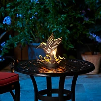 Glitzhome® 9.75" Metal Flying Hummingbird Silhouette Solar Powered Edison Bulb Outdoor Lanterns, 2ct.