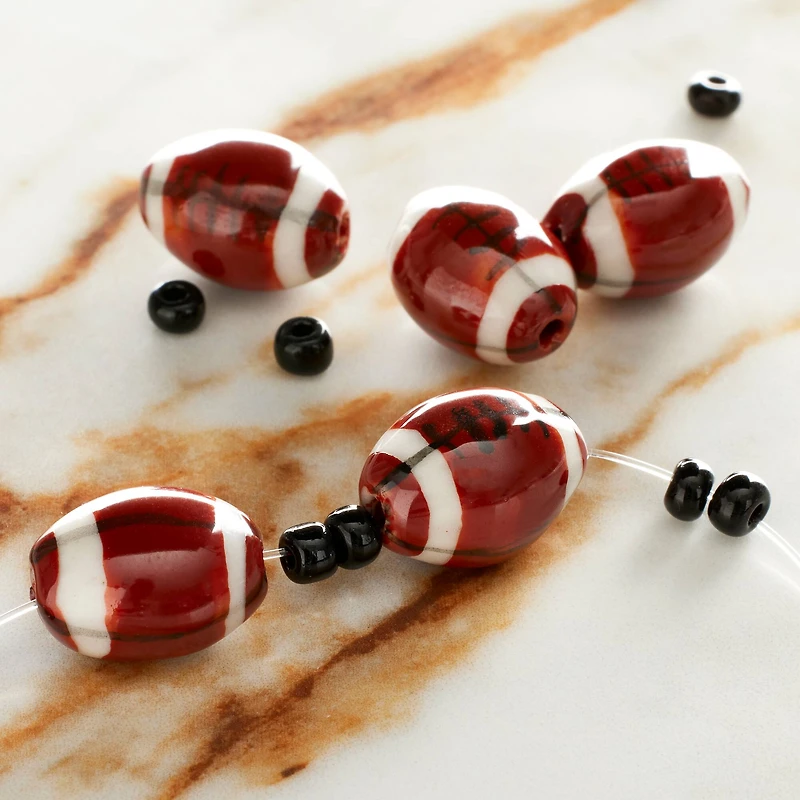 Ceramic Football Beads, 15mm by Bead Landing™