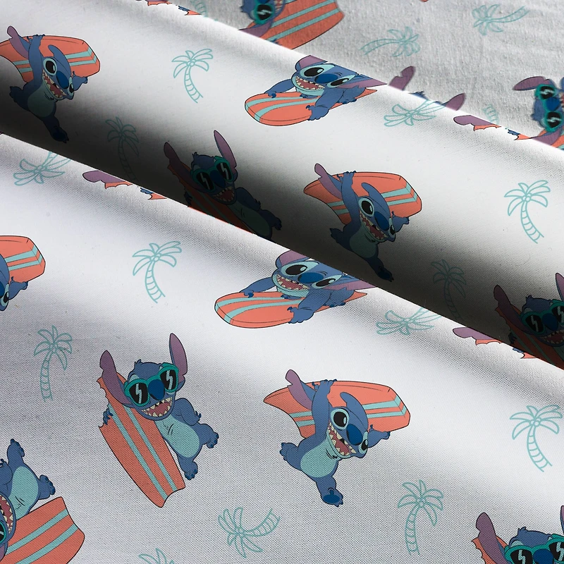 Disney® Lilo & Stitch Surfing Toss Cotton Fabric