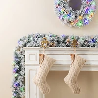 Glitzhome® 9ft Pre-Lit Snow Flocked Greenery Pine Christmas Garland with Timer