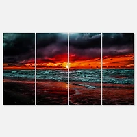 Designart - Red Sunset over Blue Waters
