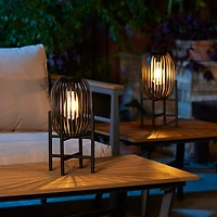 Glitzhome® 14.25" Black Slim Metal Stripes Solar Powered Edison Bulb Outdoor Lantern, 2ct.