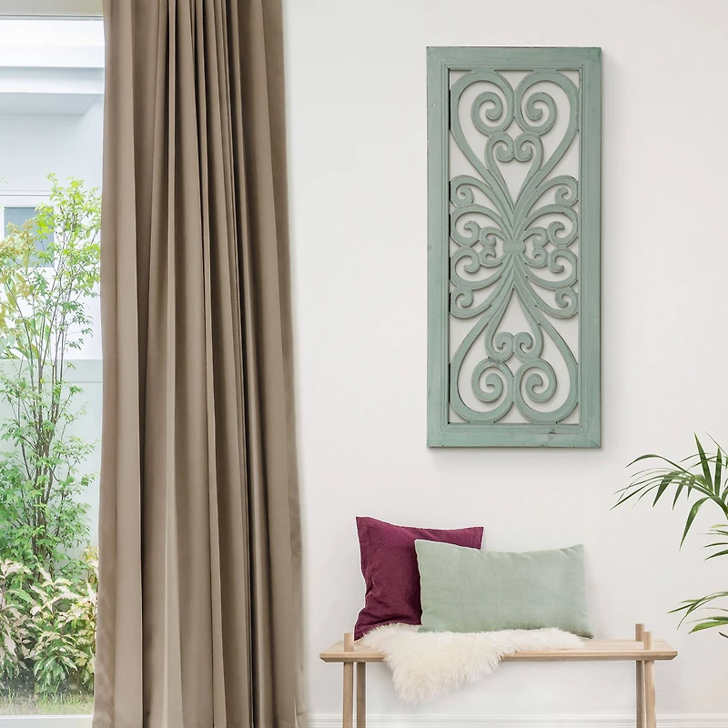 American Art Décor™ 36" Distressed Hand-Carved Seafoam Green Wood Wall Medallion Panel