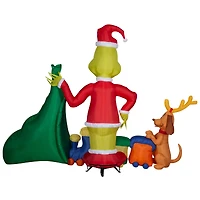 6.5ft. Airblown® Inflatable Christmas Grinch Putting Train in Santa Sack