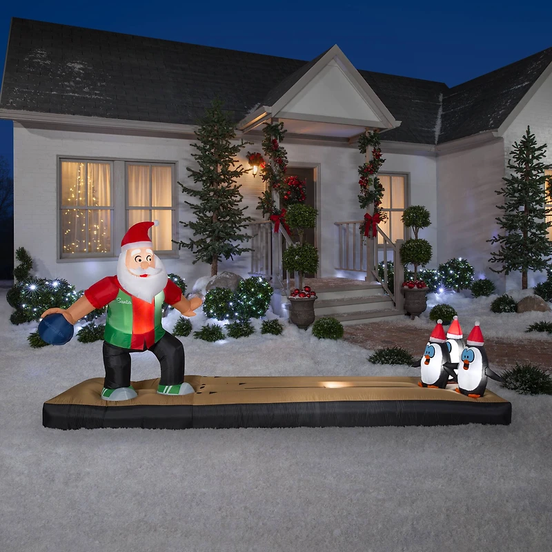 5ft. Airblown® Inflatable Christmas Santa Bowling Scene
