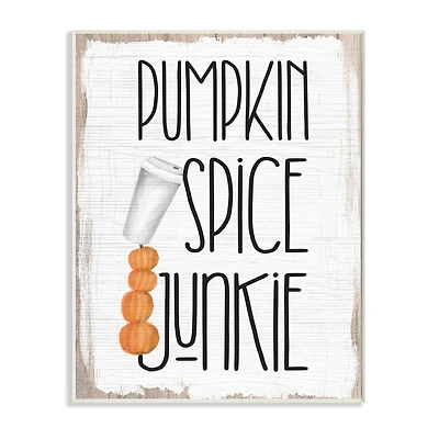Stupell Industries Pumpkin Spice Junkie Phrase Balancing Coffee Cup Wood Wall Plaque