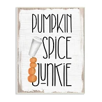 Stupell Industries Pumpkin Spice Junkie Phrase Balancing Coffee Cup Wood Wall Plaque