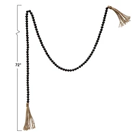 Hello Honey® 6ft. Black Wood Bead Garland with Jute Tassels